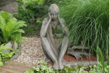 Statue de jardin Tristan assis pierre reconstituée H. 86 cm